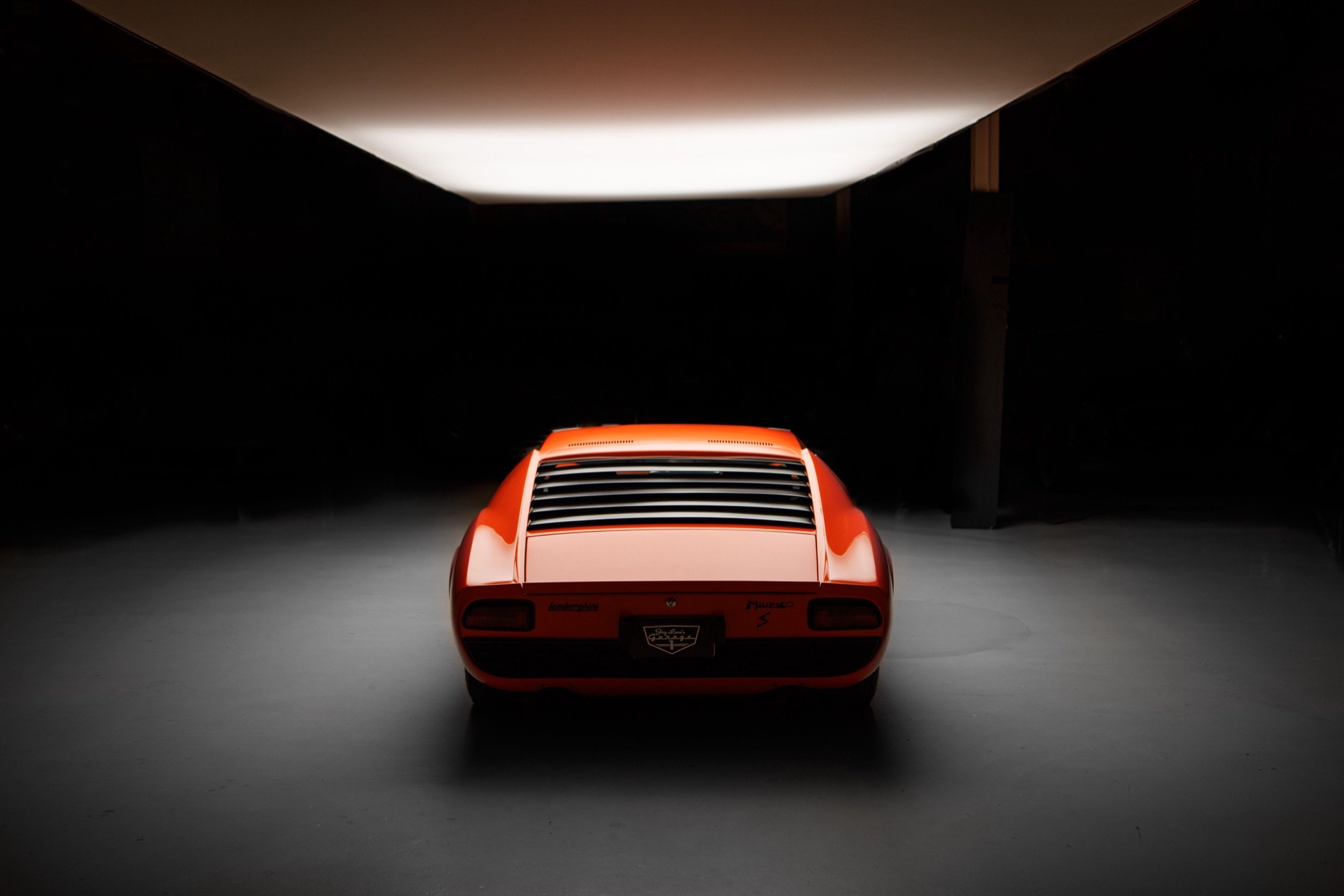 Lamborghini Miura in a dark studio — luxury cars on Carzle